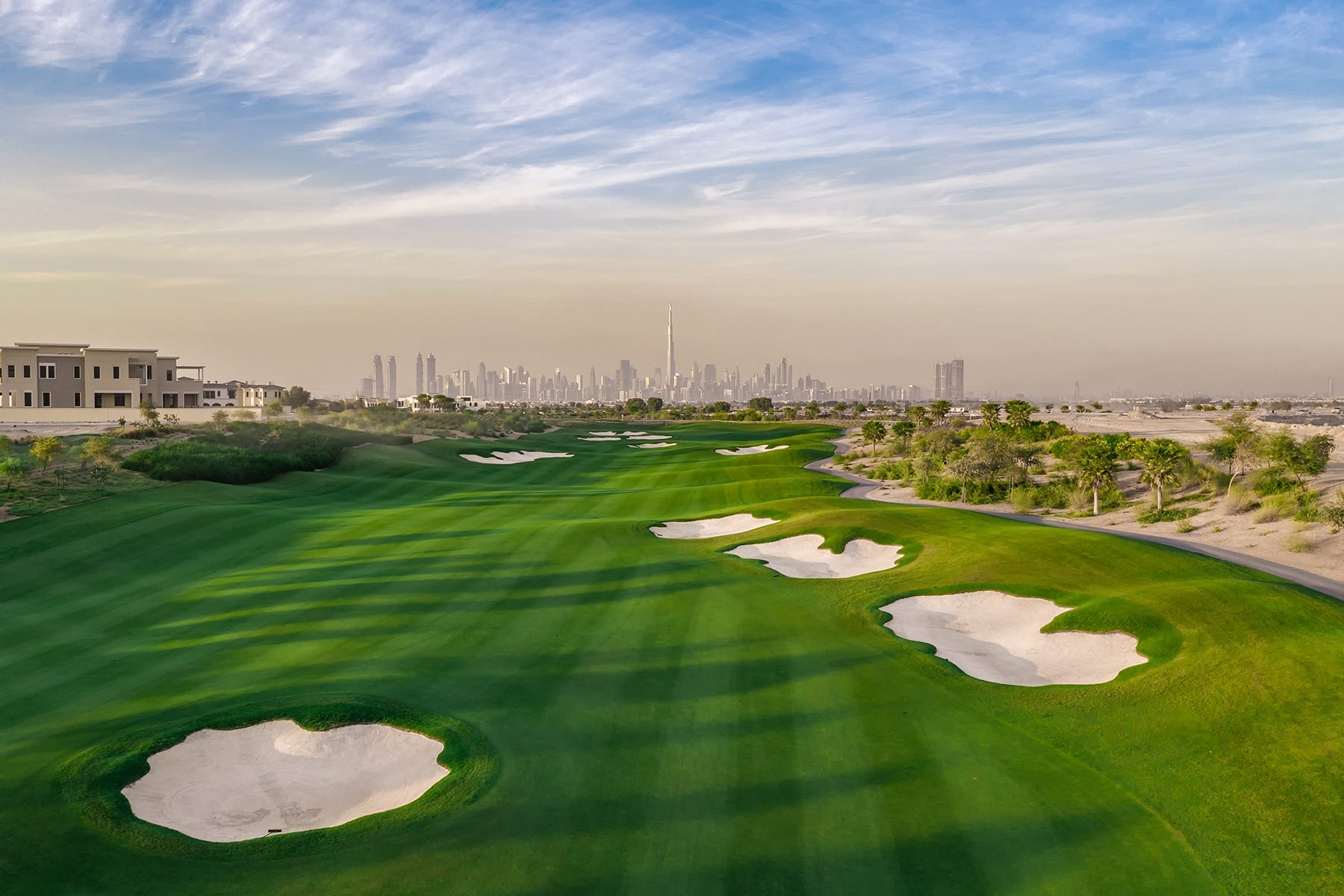 https://www.dubaihillsgolfclub.com/wp-content/uploads/2020/05/Dubai-Hills-Golf-Club-Homepage-golf-inner.jpg?utm_source=chatgpt.com